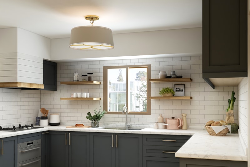 A tiled kitchen backsplash above a counter and sink with cabinets above.